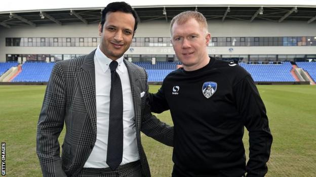 Abdallah Lemsagam (left) previously appointed former Manchester United and England midfielder Paul Scholes (right) as Oldham's manager last season