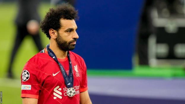 Liverpool's Mohamed Salah looks dejected after losing the 2022 Champions League final to Real Madrid
