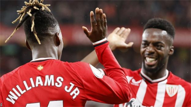 Nico and Inaki Williams celebrate a goal