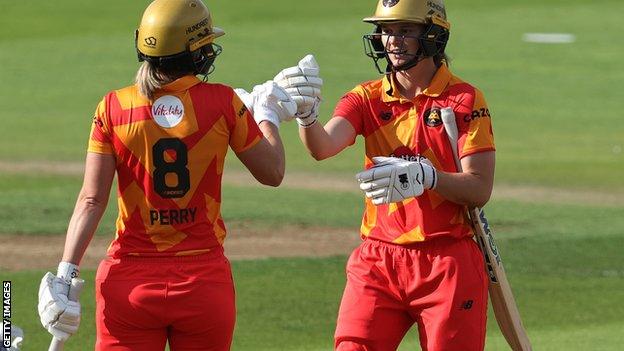Birmingham Phoenix's Ellyse Perry (left) and Amy Jones (right) bump fists after their win over Trent Rockets