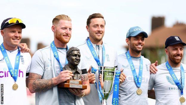 England players (from left to right) Ollie Pope, Ben Stokes, Ollie Robinson, Ben Foakes and Jack Leach pose after beating South Africa in the Test series