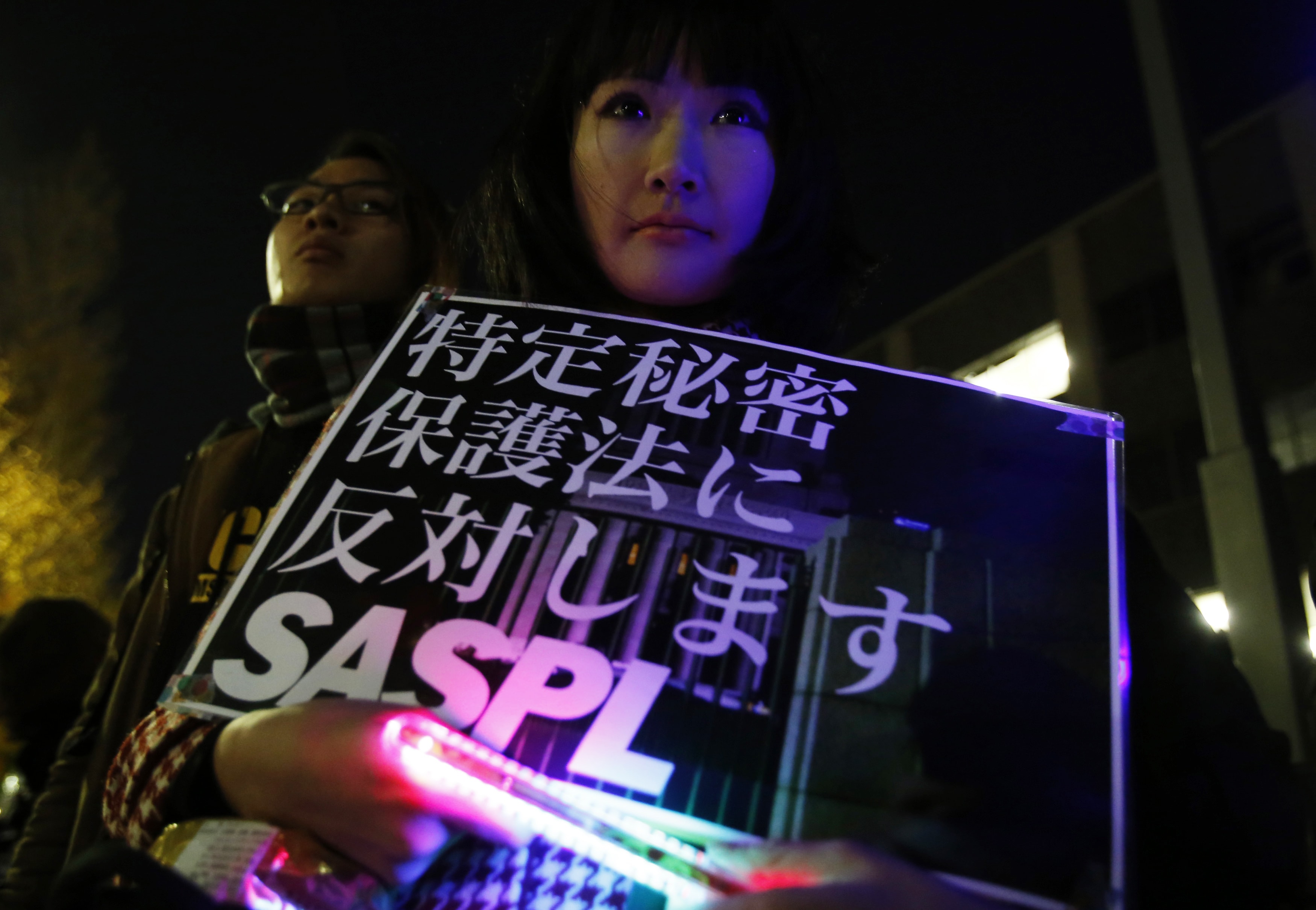 A protester demonstrates against the state secrets law during a rally in Tokyo, 9 December 2014, REUTERS/Yuya Shino