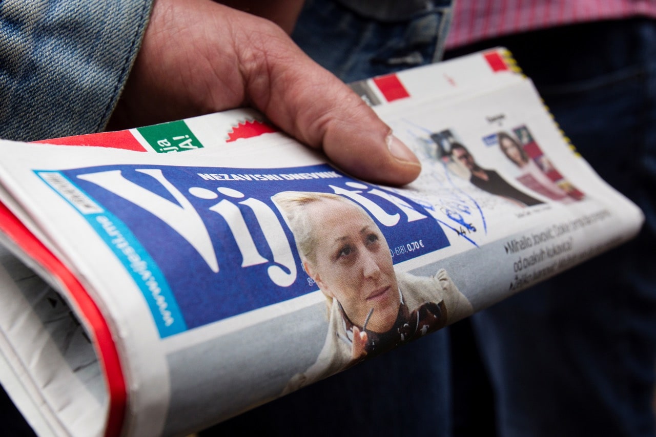 The front-page of daily newspaper "Vijesti" with a picture of attacked investigative reporter Olivera Lakic, is seen during a protest in Podgorica, Montenegro, 9 May 2018 , REUTERS/Stevo Vasiljevic