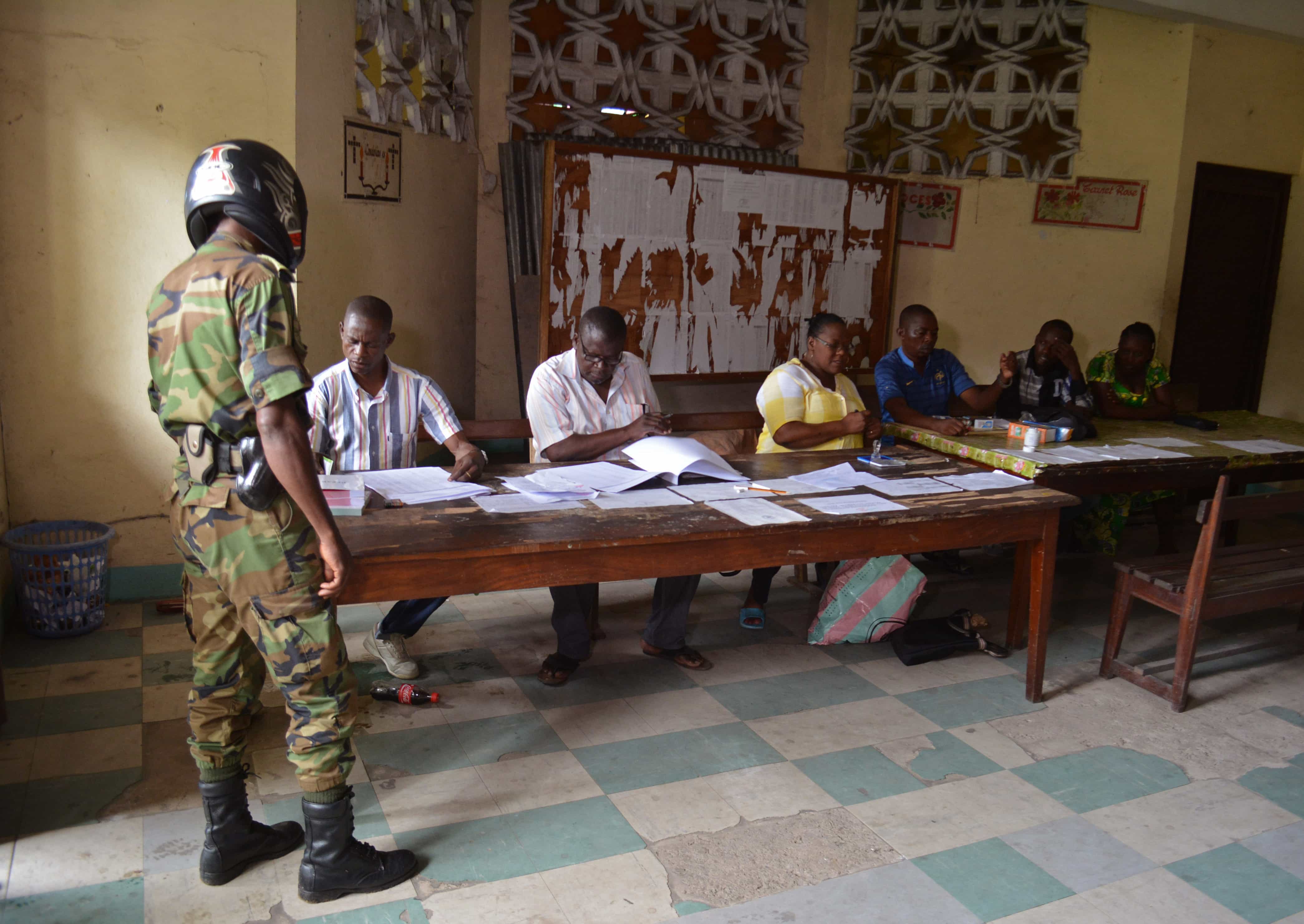 A soldier prepares to cast his ballot in Brazzaville, Congo, 20 March 2016., AP Photo/John Bompengo