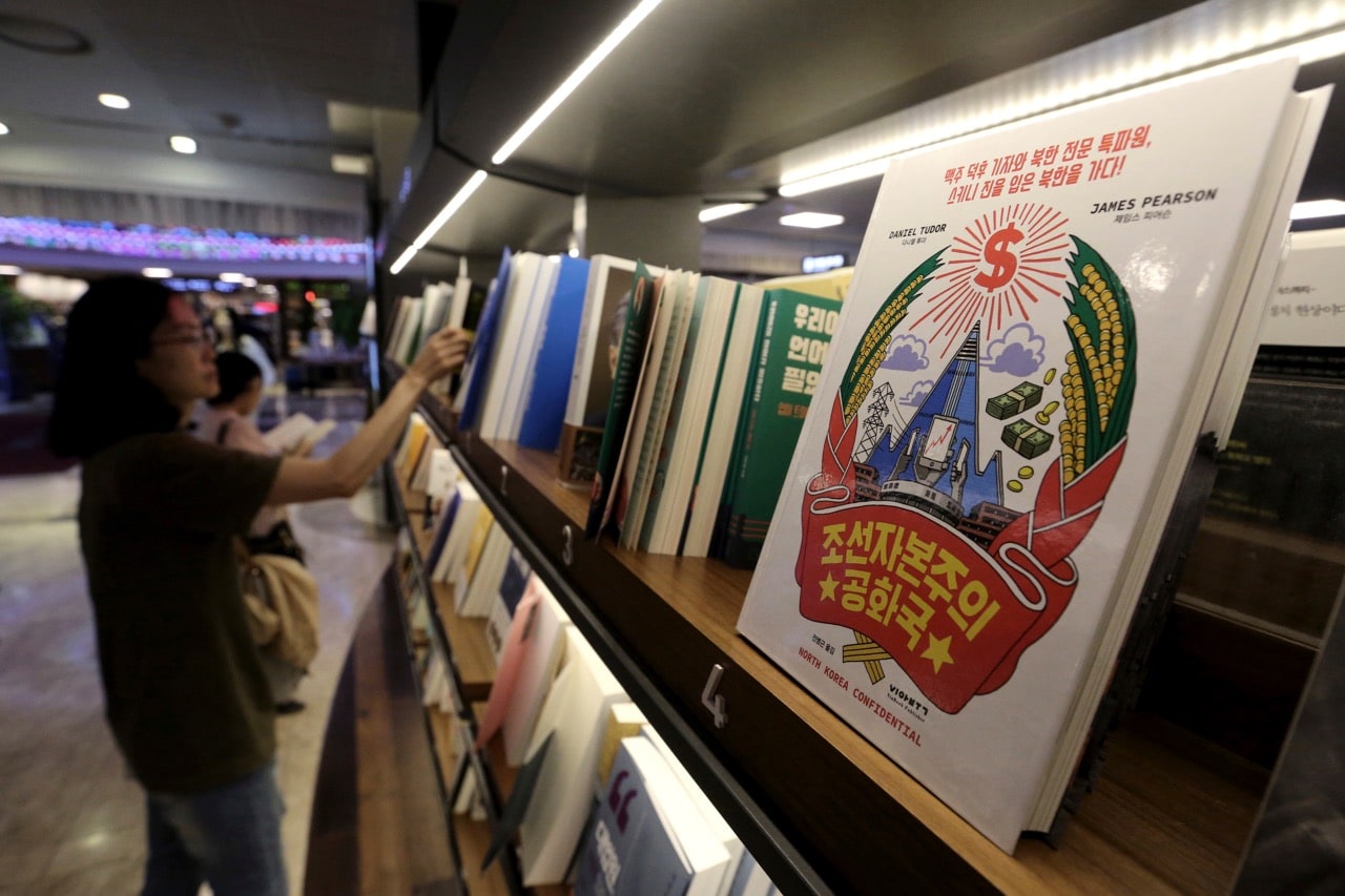A copy of the Korean version of "Capitalist People's Republic of Korea", right, is displayed at Kyobo Book Store in Seoul, South Korea, 31 August 2017, AP Photo/Ahn Young-joon