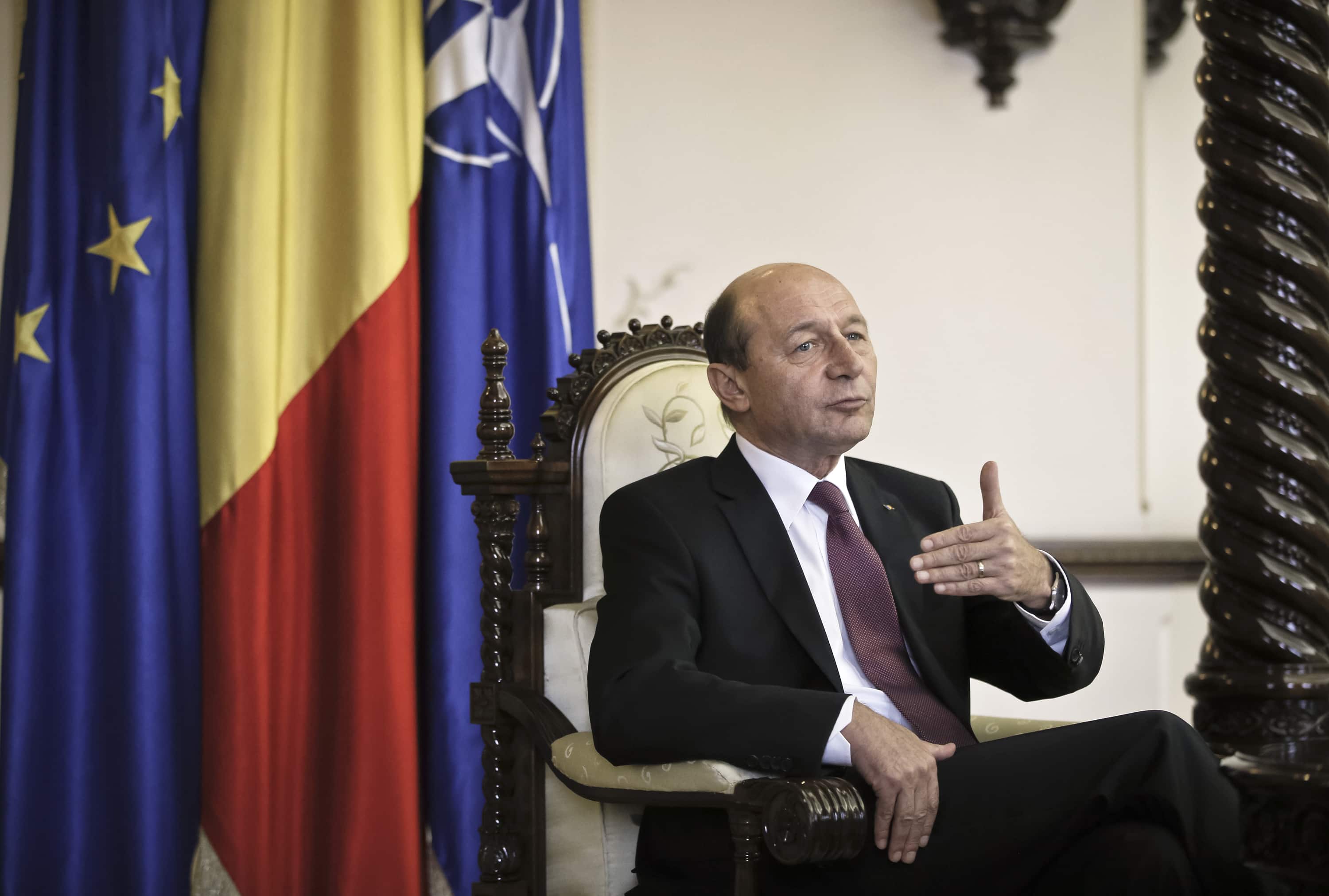 Romanian President Traian Basescu gestures during an interview with the Associated Press in Bucharest, Romania, 7 March 2013., AP Photo/Vadim Ghirda