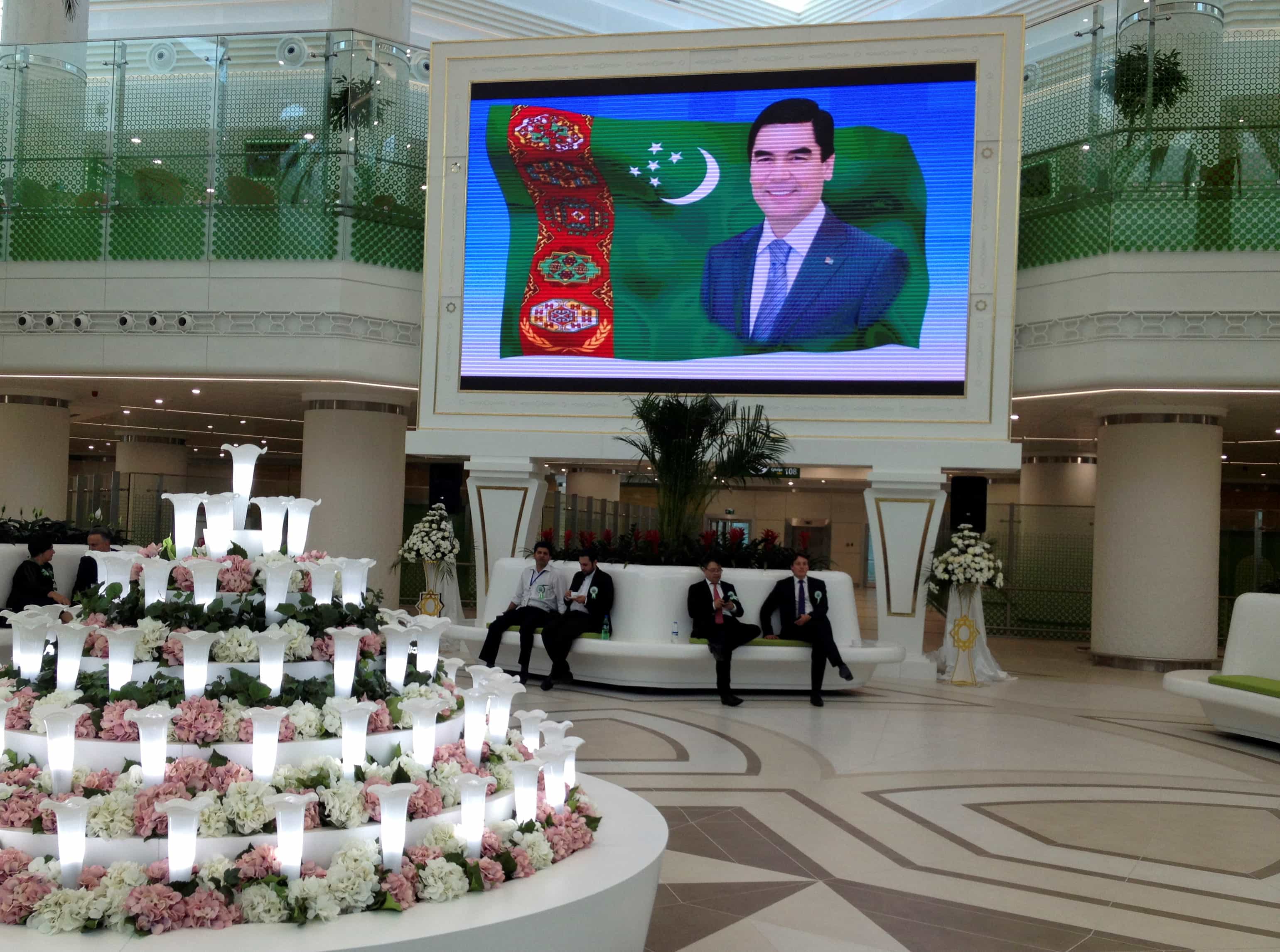 A screen showing a portrait of President Gurbanguly Berdimuhamedov is seen during the official opening of a newly built airport in Ashgabat, Turkmenistan, 17 September 2016, REUTERS/Marat Gurt
