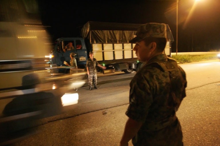 Ecuadorean soldiers check persons and vehicles near the Colombian border in Santa Cecilia, Nueva Loja, Sucumbios, 5 March 2008, RODRIGO BUENDIA/AFP via Getty Images