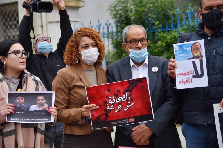 Members of the Tunisian Journalists Union pose with posters in support of imprisoned Moroccan journalists Omar Radi and Souleimane Raissouni, in Tunis, on the occasion of World Press Freedom Day, 3 May 2021, Jdidi wassim/SOPA Images/LightRocket via Getty Images
