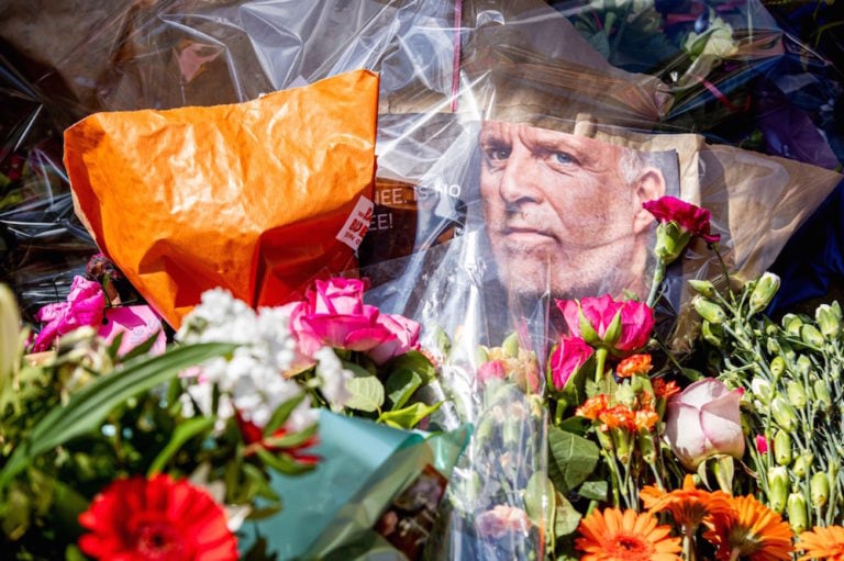 Flowers are placed at the site where crime reporter Peter R. De Vries was shot, in Amsterdam, Netherlands, 8 July 2021, Patrick van Katwijk/BSR Agency/Getty Images
