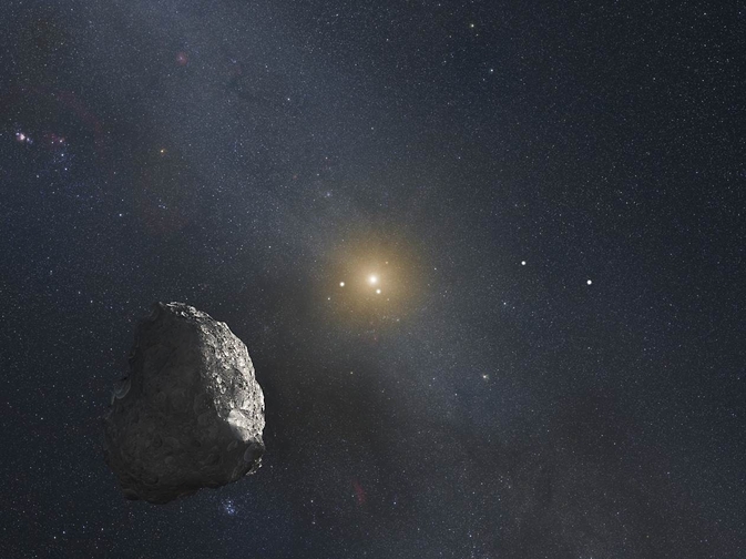 Artist's comet of a Kuiper Belt object orbiting the Sun. The Sun is a small bright dot from this distance.