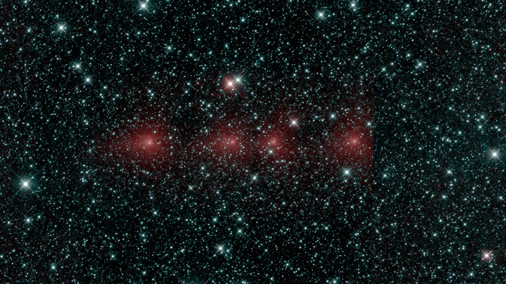 This image shows comet C/2018 Y1 Iwamoto as imaged in multiple exposures of infrared light by NASA's Near-Earth Object Wide-field Survey Explorer (NEOWISE) space telescope.