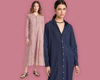 Two women one up front in navy blue long sleeve dress and one in back in pink long floral dress on a pink background
