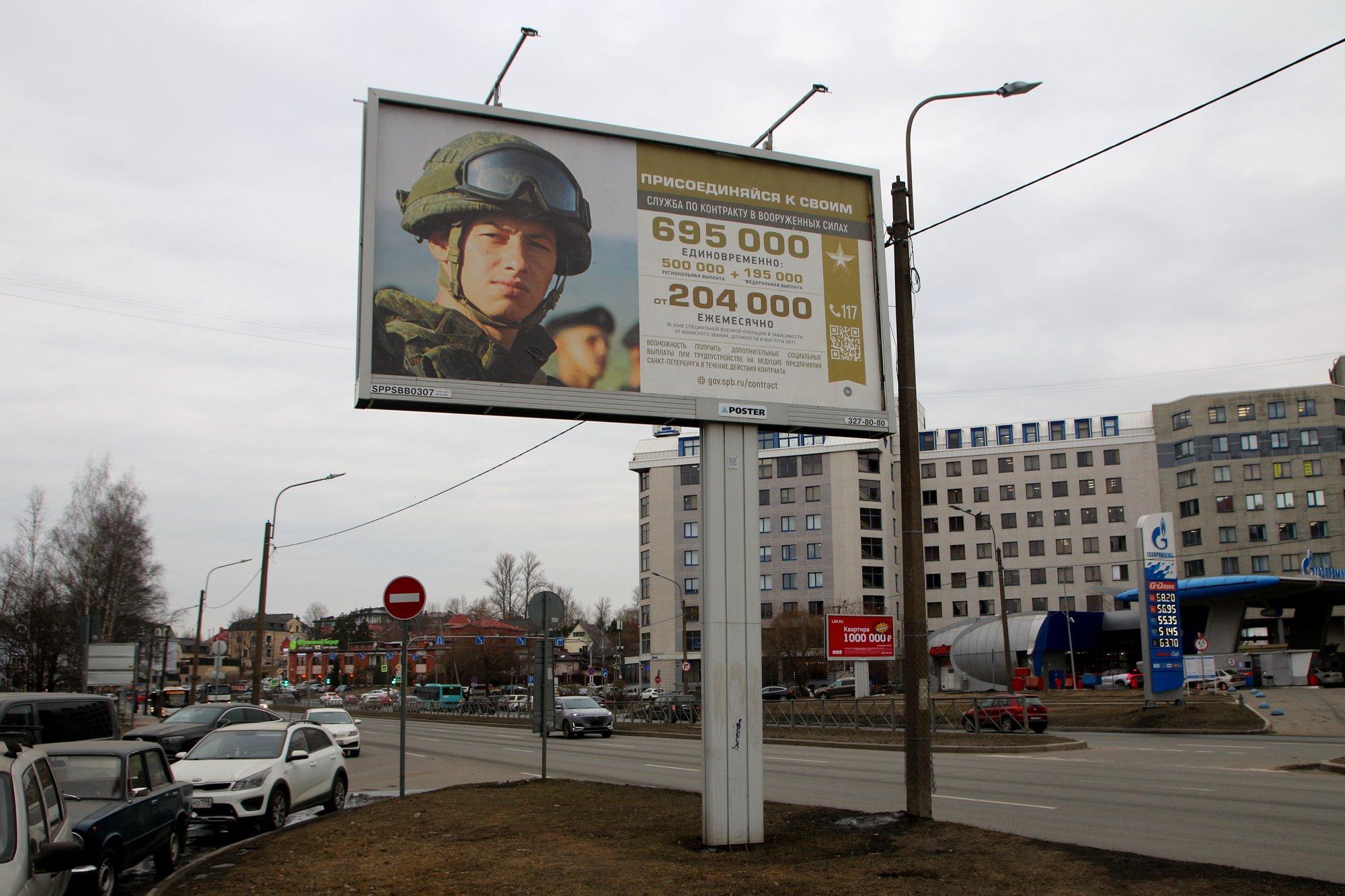 Billboard with information about contract service in Saint Petersburg, Russia - 13 Mar 2024