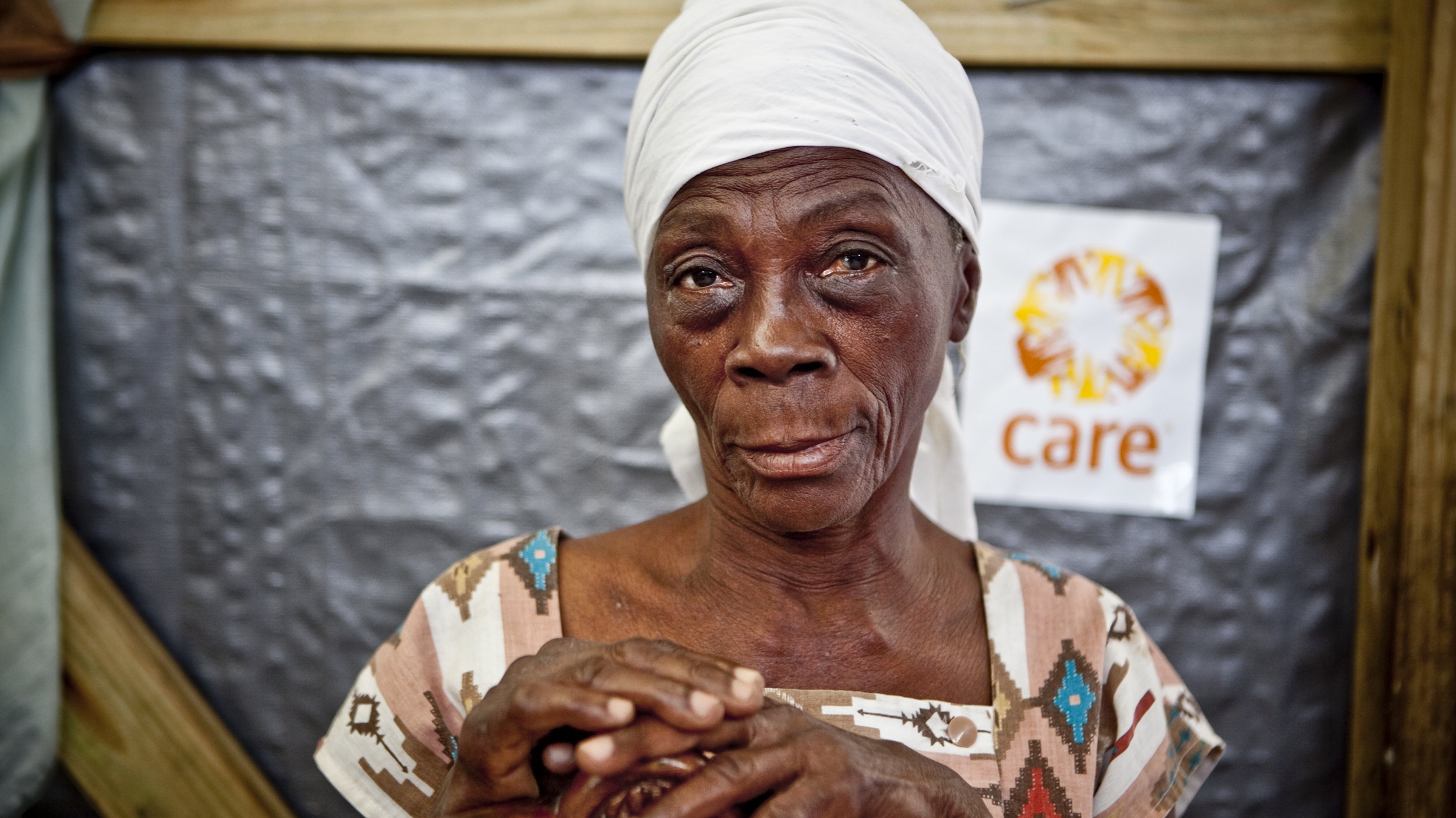 A woman in her transitional shelter in Astek, Carrefour.