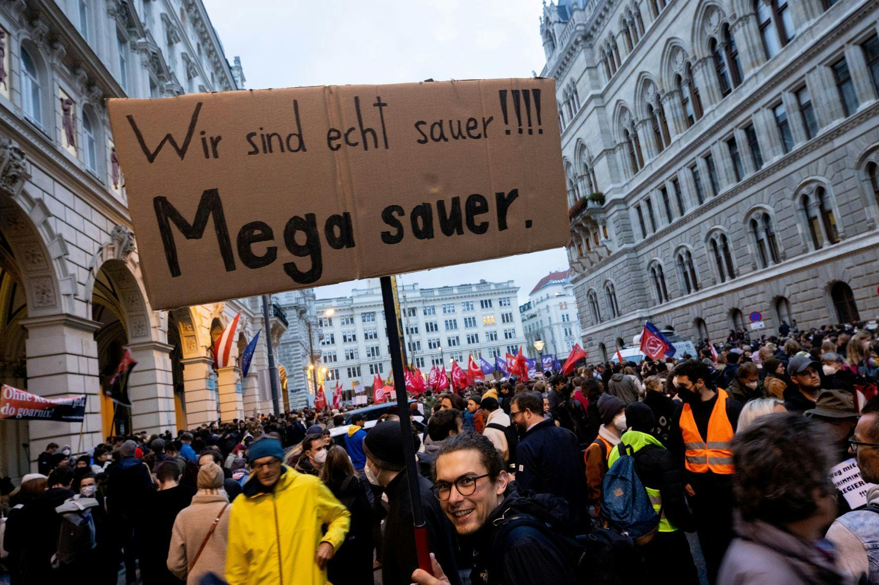 Protesters in Vienna, Austria demanding Chancellor Sebastian Kurz's resignation, German-language sign reads: "We are really angry, mega angry"