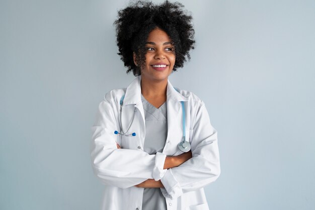 Female doctor wearing white coat front view