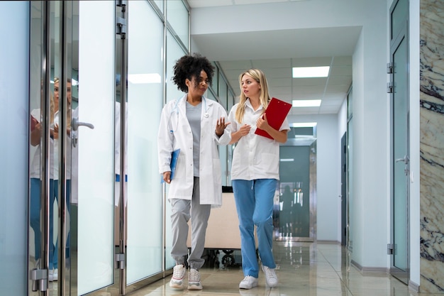 Front view female doctors at clinic