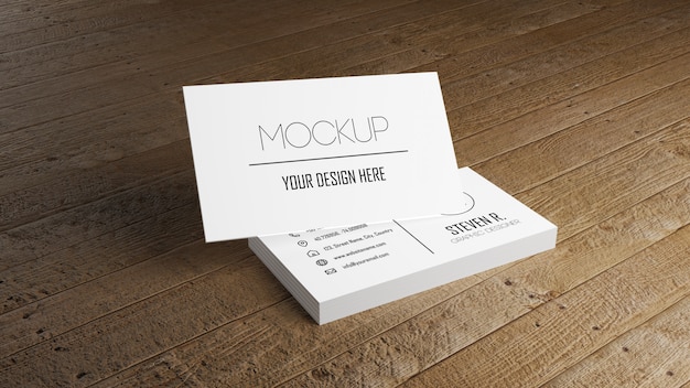 PSD white business card mockup stacking on wooden table.