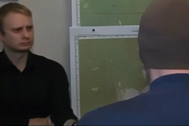 Фрагмент интервью с мужчиной, обезвредившим одного из нападавших в зрительном зале "Крокус Сити Холла" в Подмосковье, 23 марта 2024 года. Скриншот видео "Россия24"