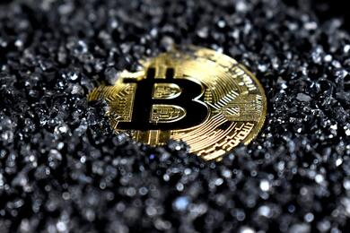 Символ криптовалюты "биткоин". Фото: Unsplash.com