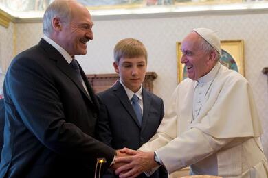 Pope Francis is greeted by Belarussian President Alexander Lukashenko and his son Nikolai during a private audience at the Vatican