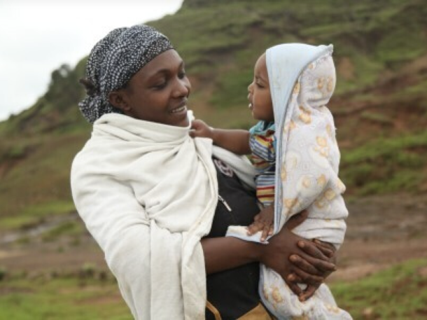 Woman holding baby 