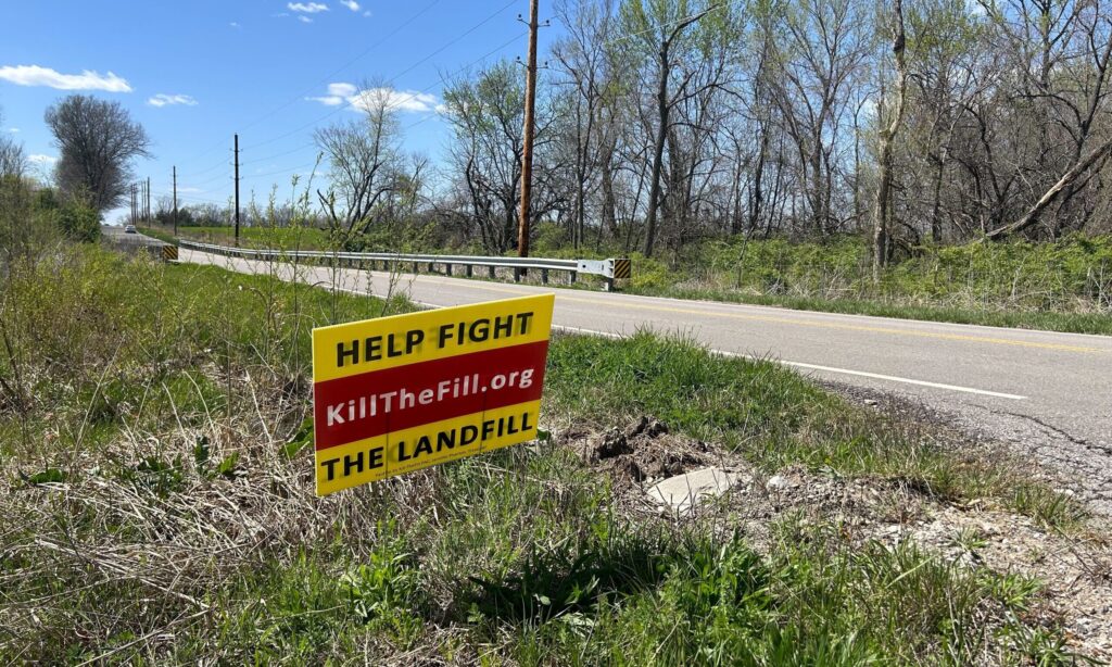 A sign across from the proposed landfill in south Kansas City implores drivers to help stop the project from moving forward.
