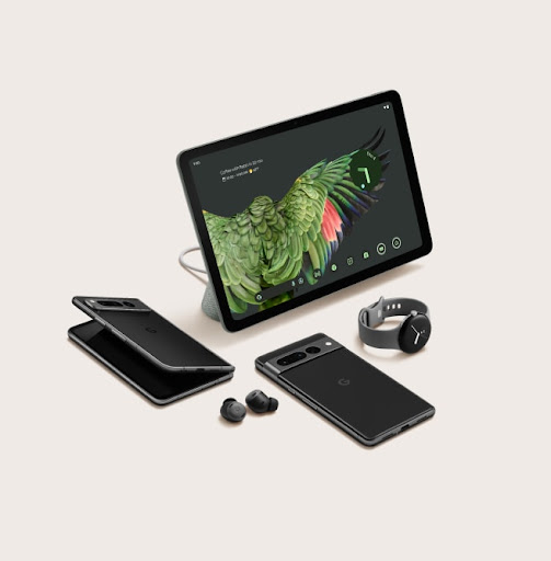 A display of the Pixel tablet, a slightly opened Pixel Fold, Pixel 7a, a pair of Pixel Buds Pro, and a Pixel Watch