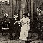 Florence Barker, Edward Dillon, and Mack Sennett in Priscilla's Engagement Ring (1911)
