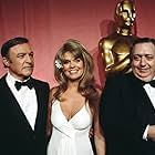 Gene Kelly, Dyan Cannon, and Henri Langlois at an event for The 46th Annual Academy Awards (1974)