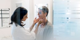 Doctor examining female patient fat hospital