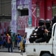 Police patrol Port-au-Prince.