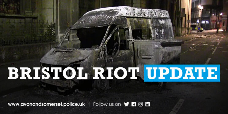Burnt out police van after arson