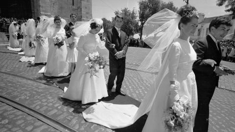 The procession to a mass wedding ceremony in Lisbon.