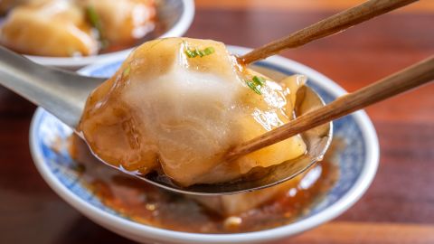 Bawan (Ba wan), Taiwanese meatball delicacy, delicious street food, steamed starch wrapped round shaped dumpling with pork inside, close up, copy space