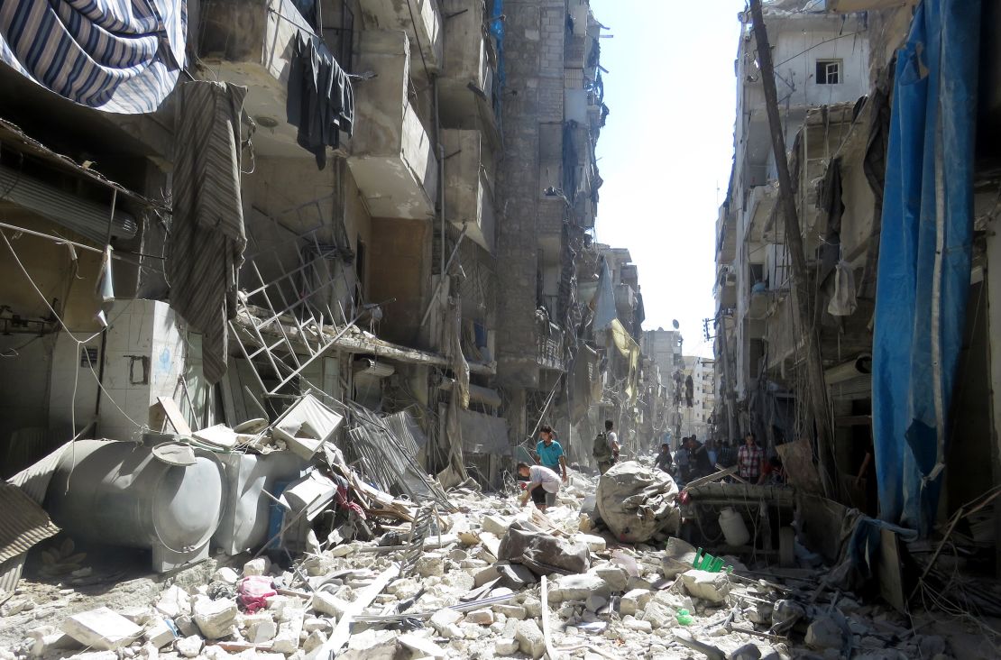A street in the rebel-held Salihin neighborhood of Aleppo is littered with debris on September 11, 2016, after Russia attacked the residential area with cluster bombs.