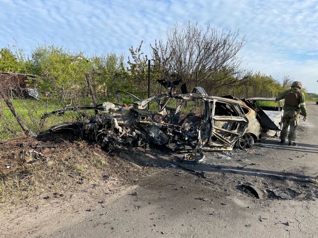 Ukrainian military escorts show CNN team the destruction left behind when the convoy was fired on by Russian troops.