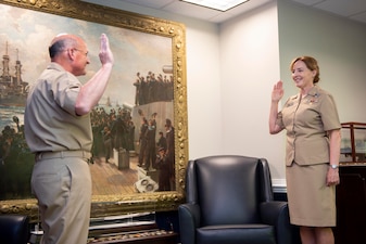 WASHINGTON (July 23, 2020) Vice Adm. Michelle Skubic, right, receives the Oath of Office from Adm. Mike Gilday, chief of naval operations, during a promotion ceremony at the Pentagon. Skubic is the 20th Supply Corps officer to pin on three stars in the corps' 225 year history and is the first woman to do so. (U.S. Navy photo by Mass Communication Specialist 1st Class Raymond D. Diaz III/Released)