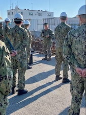 ROTA, Spain (Jan. 15, 2021) - Chief of Naval Operations (CNO) Adm. Mike Gilday and Master Chief Petty Officer of the Navy (MCPON) Russ Smith address the crews of the Arleigh Burke-class guided-missile destroyers USS Roosevelt (DDG 80) and USS Ross (DDG 71) pier side. Gilday and Smith are visiting Rota to highlight the importance of warfighting and readiness to Sailors in the region. (U.S. Navy photo by Cmdr. Nate Christensen/Released)