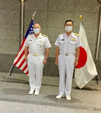 Chief of Naval Operations (CNO) Adm. Mike Gilday stands for a photo with Chief of the Maritime Staff Adm. Hiroshi Yamamura.