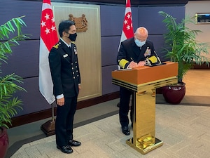 SINGAPORE (July 26, 2021) - Chief of Naval Operations (CNO) Adm. Mike Gilday visits the Singapore Ministry of Defense with Chief of Navy, Republic of Singapore Navy Rear Adm. Aaron Beng during a trip to the region. Gilday visited the region to meet with senior military and government leadership to reaffirm the U.S. Navy’s commitment to our partners and allies and help keep the seas open and free. (U.S. Navy photo by Cmdr. Nate Christensen/Released)