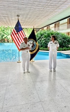 NEW DELHI (Oct. 12, 2021) Chief of Naval Operations (CNO) Adm. Mike Gilday, left, delivers remarks during a promotion ceremony for Rear Adm. Eileen Laubacher, the U.S. defense attaché for the U.S. Embassy in New Delhi.  Gilday is in India to meet with India Chief of Naval Staff Admiral Karambir Singh and other senior leaders from the Indian Navy and government.  (U.S. Navy photo by Cmdr. Nate Christensen/Released)
