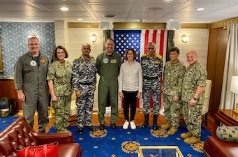 BAY OF BENGAL (Oct. 14, 2021) Chief of Naval Operations Adm. Mike Gilday, right, poses for a photo with distinguished visitors from the Indian Navy including Indian Chief of Naval Staff Adm. Karambir Singh and Vice Adm. A.B. Singh, Commander in Chief, Eastern Naval Command, U.S. Chargé d’Affaires Patricia Lacina, Rear Adm. Dan Martin, Commander, Carrier Strike Group 1, and other U.S. Navy senior leaders aboard USS Carl Vinson (CVN 70) during Exercise Malabar. MALABAR is a maritime exercise designed to improve integration, address common maritime security priorities and concerns, enhance interoperability and communication, and strengthen enduring relationships between the Royal Australian Navy, Royal Indian Navy, JMSDF, and U.S. maritime forces. (U.S. Navy photo by Cmdr. Nate Christensen/Released)