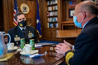 Chief of the Peruvian navy Adm. Alberto Acal�, left, speaks with Chief of Naval Operations (CNO) Adm. Mike Gilday at the 24th International Seapower Symposium (ISS).