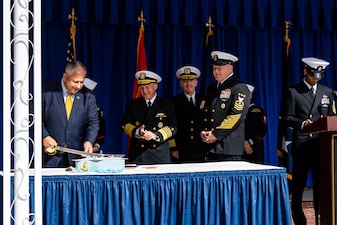 WASHINGTON (Oct. 12, 2022) Secretary of the Navy Carlos Del Toro cuts a cake for the Navy's 247th birthday celebration at the Pentagon, Oct. 12. The theme for this year’s birthday celebration is "On Watch - 24/7 for 247 Years." (U.S. Navy photo by Mass Communication Specialist 1st Class Michael B Zingaro/released)