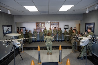 POINT MUGU, Calif. (Dec. 1, 2023) - Chief of Naval Operations Adm. Lisa Franchetti recognizes Sailors of the Year while visiting Naval Air Warfare Center Weapons Division (NAWCWD) in Point Mugu, Calif., Dec. 1. Franchetti visited NAWCWD to see first-hand their initiatives dedicated to delivering integrated and interoperable warfighting capabilities through cutting-edge research, development, test, evaluation, and sustainment. (U.S. Navy photo by Chief Mass Communication Specialist Michael B. Zingaro)