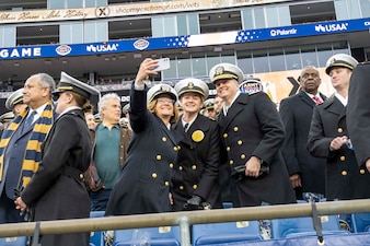 FOXBOROUGH, Mass.  (Dec. 9, 2023) – Chief of Naval Operations Adm. Lisa Franchetti meets with United States Naval Academy Midshipmen in the stands during the 124th Army Navy Game at Gillette Stadium in Foxborough, Mass., Dec. 9. One of the oldest and most storied rivalries in collegiate athletics, Navy leads Army in the series with a 62-55-7 record. (U.S. Navy photo by Chief Mass Communication Specialist Amanda R. Gray)