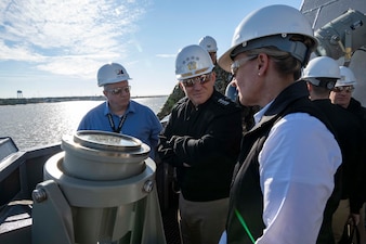 PASCAGOULA, Mississippi (Jan, 26, 2023) - Chief of Naval Operations Adm. Mike Gilday talks with leadership from Ingalls Shipyard, while touring pre-commissioning unit (PCU) Jack H. Lucas (DDG 125) in Pascagoula, Mississippi, Jan. 26. During his visit, he toured the shipyard, visited PCU Jack H. Lucas and PCU Richard M. McCool (LPD 29), and met with employees and shipyard leadership. (U.S. Navy photo by Amanda R. Gray/released)