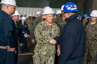 NEWPORT NEWS, Va. (March 2, 2023) Chief of Naval Operations (CNO) Adm. Mike Gilday meets with Sailors in the hangar bay of USS George Washington (CVN 73) during a ship visit, March 2. George Washington is undergoing refueling and complex overhaul (RCOH) at Newport News Shipyard. RCOH is a multi-year project performed only once during a carrier’s 50-year service life that includes refueling the ship’s two nuclear reactors, as well as significant repairs, upgrades, and modernization. (U.S. Navy photo by Chief Mass Communication Specialist Amanda R. Gray)